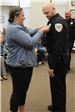 030323 Police Promotion Detective Britt Jameson receives badge