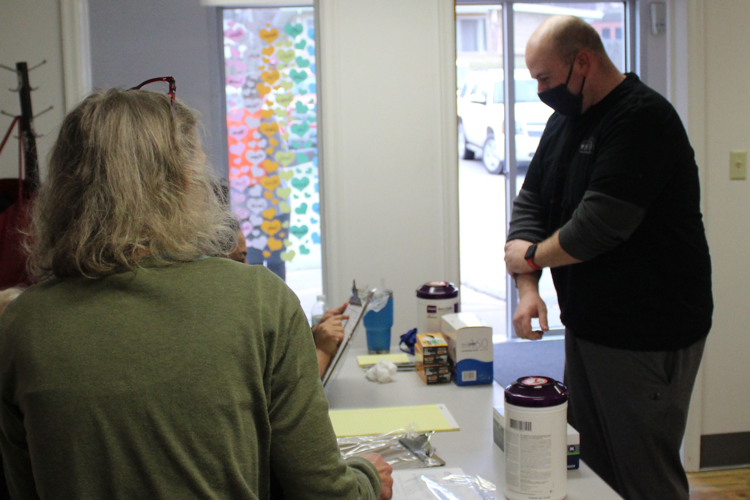 122320 Vaccine EMS 04 Craig Chelf checks in (JPG)