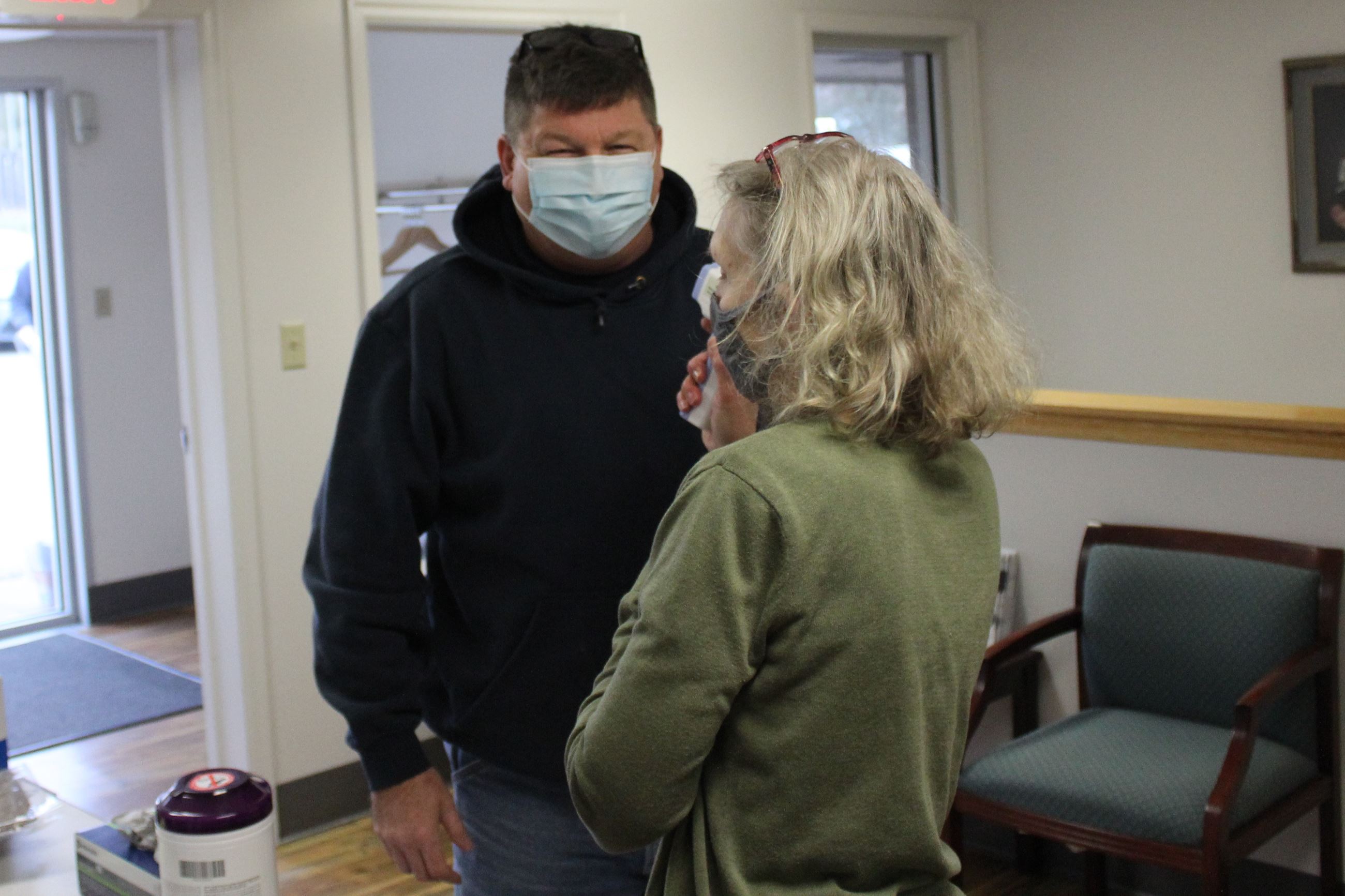 122320 Vaccine EMS 05 Muscatigne Firefighters has temperature checked (JPG)