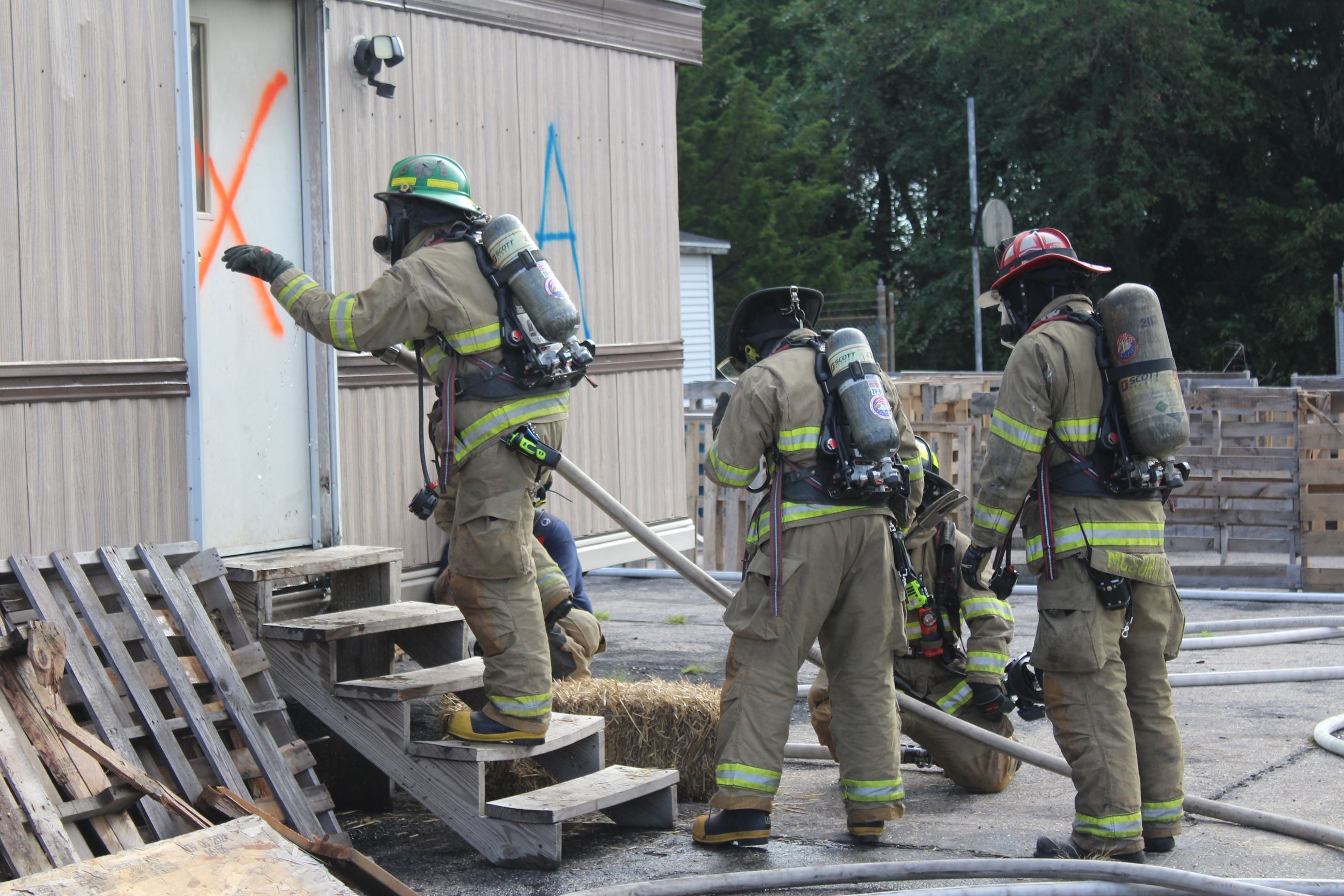 Preparing to enter trailer - Fire Academy Training Burn 090222 (JPG)