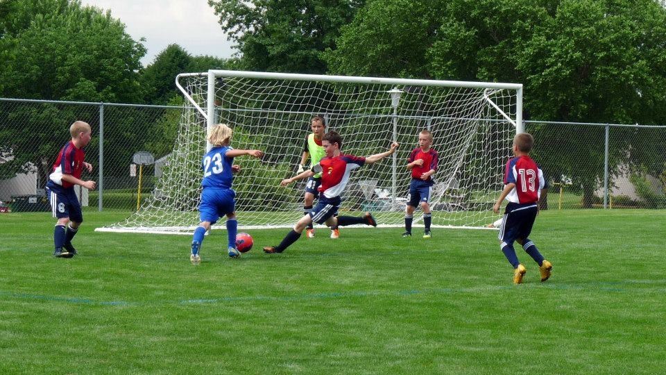 Photograph of children playing soccer at Muscatine Soccer Complex (JPG)